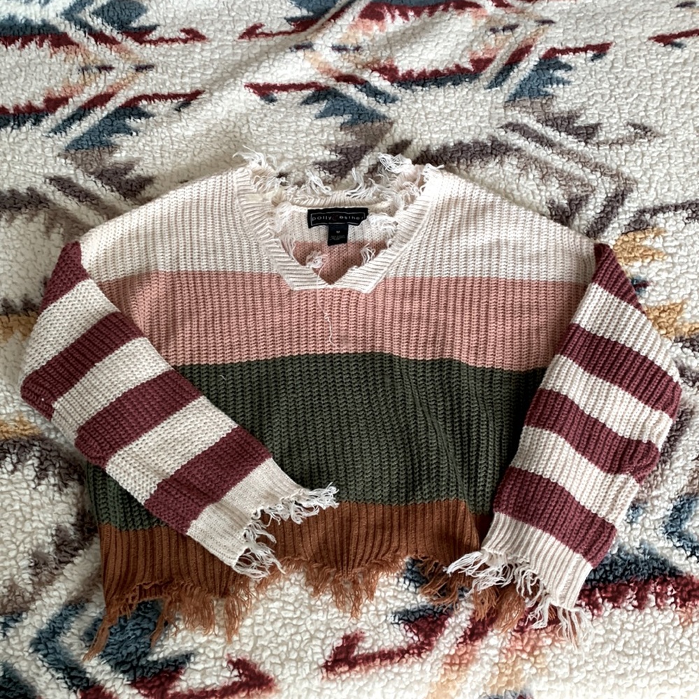Distressed knit sweater